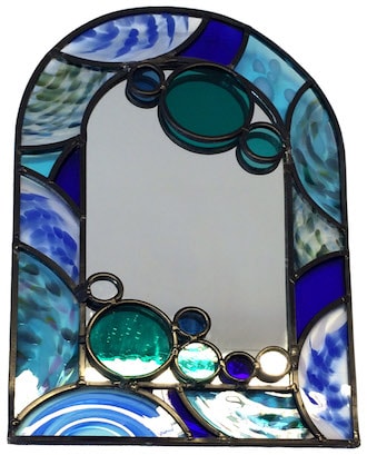A leaded mirror commission using bath aqau glass hand made roundels