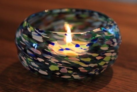 tea light holder with lit candle